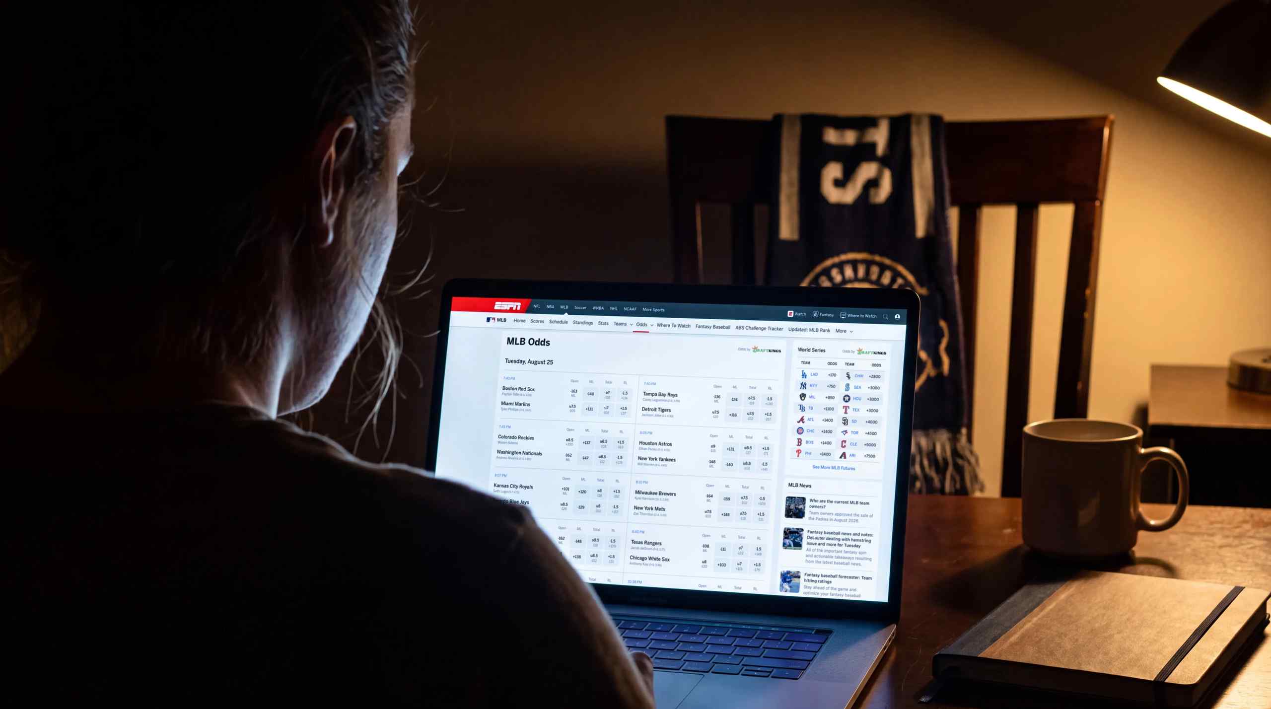 Checking MLB odds on laptop